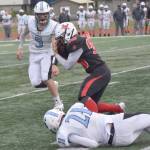 Kenai Centrals Tyler Van Sky recovers a fumble in front of Chugiaks Sam Young (5) on Saturday, Sept. 7, 2024, at Ed Hollier Field at Kenai Central High School in Kenai, Alaska. (Photo by Jeff Helminiak/Peninsula Clarion)