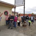 Kenai Mayor Brian Gabriel waves to a line of people during a ribbon-cutting event for The Glaze in Kenai, Alaska, on Wednesday, Sept. 4, 2024. (Jake Dye/Peninsula Clarion)