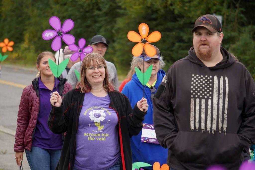Attendees set out on the Second Annual Kenai Peninsula Walk to End Alzheimers at the Challenger Learning Center of Alaska in Kenai, Alaska, on Saturday, Sept. 7, 2024. (Jake Dye/Peninsula Clarion)