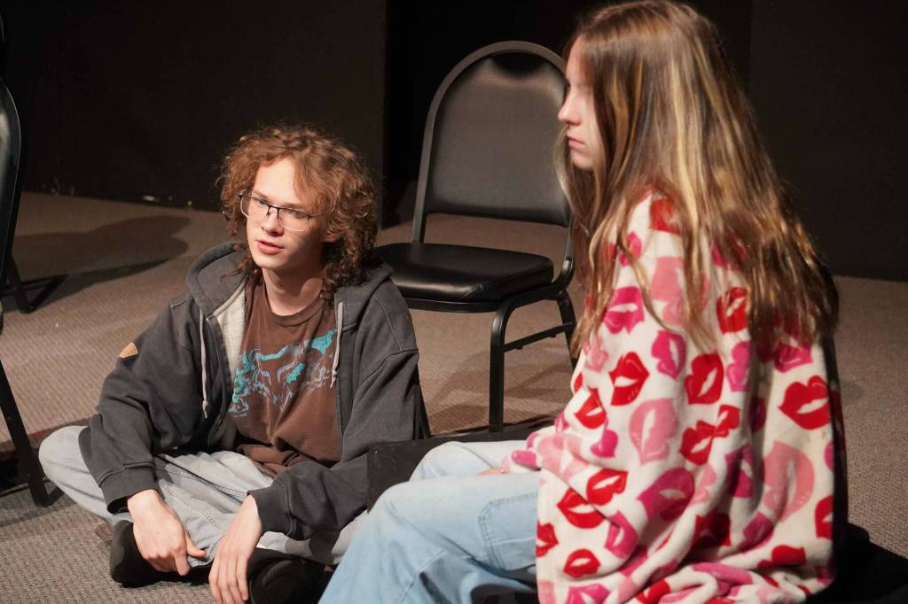 Gavin Hunt and Lily Guest, part of the Kenai Performers cast of The Bullying Collection, rehearse at the Kenai Performers Theater in Kalifornsky, Alaska, on Monday, Sept. 9, 2024. (Jake Dye/Peninsula Clarion)