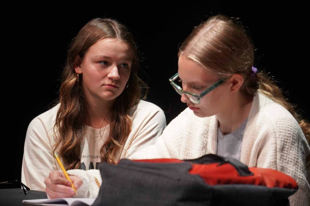 Marah Ivy and Arwen Waarvik, part of the Kenai Performers cast of The Bullying Collection, rehearse at the Kenai Performers Theater in Kalifornsky, Alaska, on Monday, Sept. 9, 2024. (Jake Dye/Peninsula Clarion)