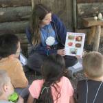 Rowan Yorkston teaching "Critter Campers" about the different shapes of eggs. (Photo provided by refuge)