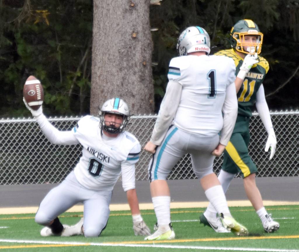 Nikiskis Oliver Parrish scores a touchdown Friday, Sept. 13, 2024, at Roger Steinbrecher Memorial Field in Seward, Alaska. (Photo by Jeff Helminiak/Peninsula Clarion)