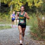Sewards Olive Jordan runs the second lap of the girls varsity race during the Wasilla Trailblazer Invite on Friday, Sept. 13, 2024, in Wasilla, Alaska. (Photo by Jeremiah Bartz/Frontiersman)
