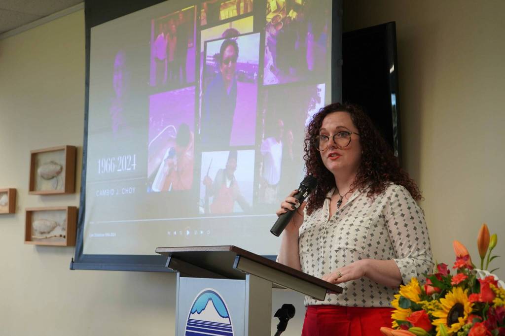 Brandi Kerley speaks before the opening of a memorial art gallery for Kenai Peninsula College Associate Professor of Art Cambid-J Cam Choy at Kenai Peninsula College in Soldotna, Alaska, on Friday, Sept. 13, 2024. (Jake Dye/Peninsula Clarion)