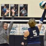 Nikiskis Ashlynne Playle puts up a block against Soldotnas Kate Curtis on Thursday, Sept. 19, 2024, at Nikiski Middle-High School in Nikiski, Alaska. (Photo by Jeff Helminiak/Peninsula Clarion)