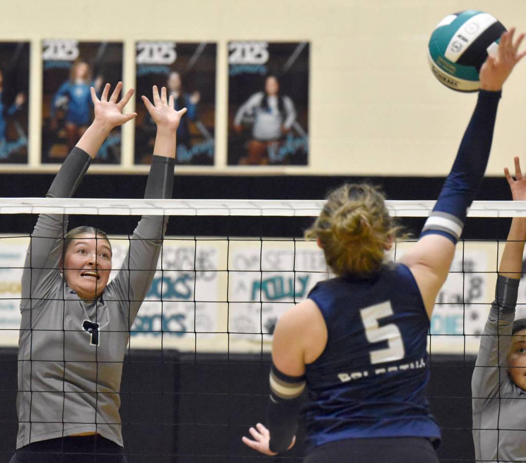 Nikiskis Ashlynne Playle puts up a block against Soldotnas Kate Curtis on Thursday, Sept. 19, 2024, at Nikiski Middle-High School in Nikiski, Alaska. (Photo by Jeff Helminiak/Peninsula Clarion)