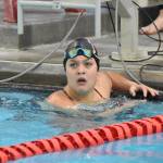 Kenai Centrals Abigail Price finishes the anchor leg in the 400-yard freestyle relay at the Kenai Invitational on Saturday, Sept. 21, 2024, at Kenai Central High School in Kenai, Alaska. (Photo by Jeff Helminiak/Peninsula Clarion)