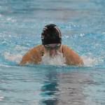 Kenai Centrals Isla Crouse competes in the 100-yard breaststroke at the Kenai Invitational on Saturday, Sept. 21, 2024, at Kenai Central High School in Kenai, Alaska. (Photo by Jeff Helminiak/Peninsula Clarion)