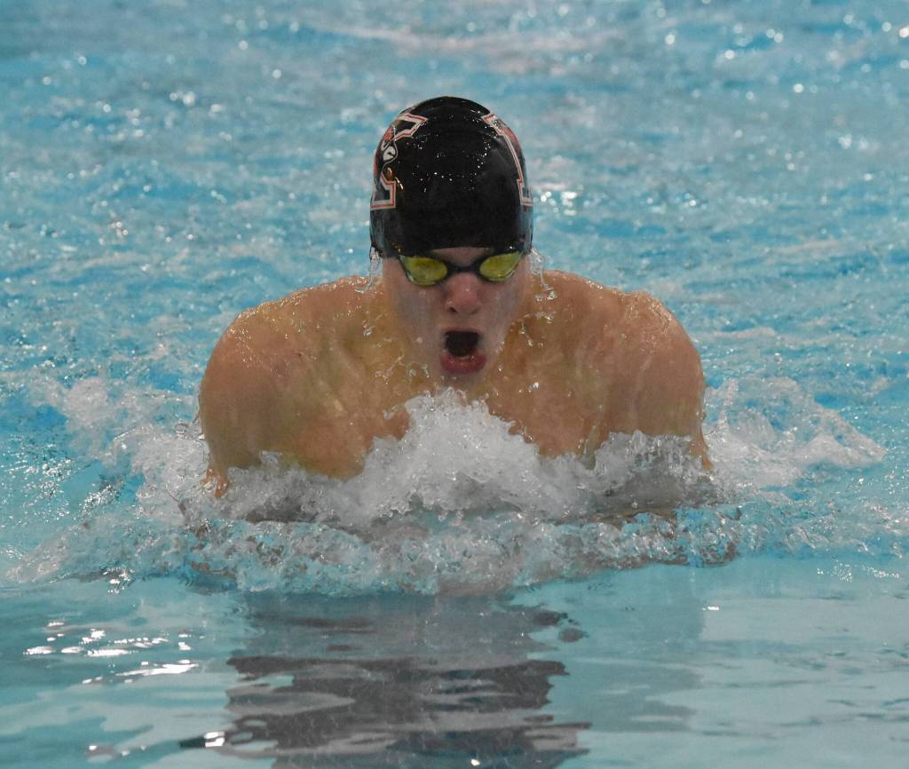 Kenai Centrals David Price competes in the 100-yard breaststroke at the Kenai Invitational on Saturday, Sept. 21, 2024, at Kenai Central High School in Kenai, Alaska. (Photo by Jeff Helminiak/Peninsula Clarion)