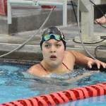 Kenai Central's Abigail Price finishes the anchor leg in the 400-yard freestyle relay at the Kenai Invitational on Saturday, Sept. 21, 2024, at Kenai Central High School in Kenai, Alaska. (Photo by Jeff Helminiak/Peninsula Clarion)