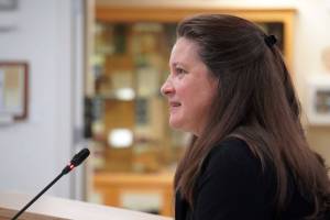Virginia Morgan, volunteer director of the Cooper Landing Community Library, speaks to the Kenai Peninsula Borough Assembly on the Public Library Assistance Grant reduction on Tuesday, Sept. 17, 2024, in Soldotna, Alaska. (Jake Dye/Peninsula Clarion)
