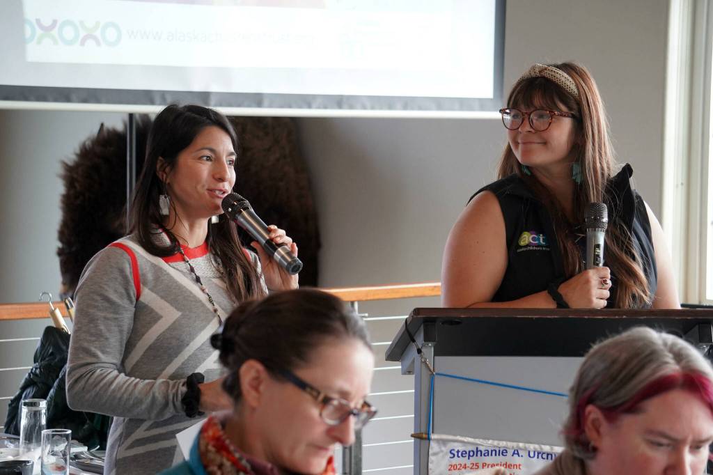 Alaska Childrens Trust Director of Communications Mirna Estrada and Director of Community Engagement Kaila Pfister recognize Jodi Stuart as a Champion for Kids during a meeting of the Soldotna Rotary Club at Addie Camp in Soldotna, Alaska, on Thursday, Sept. 26, 2024. (Jake Dye/Peninsula Clarion)