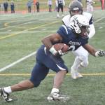 Soldotnas Andon Wolverton scores in front of Eagle Rivers Michael Roschi on Friday, Sept. 27, 2024, at Justin Maile Field at Soldotna High School in Soldotna, Alaska. (Photo by Jeff Helminiak/Peninsula Clarion)