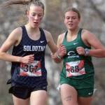 Soldotnaճ Tania Boonstra runs just ahead of Colonyճ Aubrey Virgin during the Division I varsity girls race of the Region 3 Championships on Saturday, Sept. 28, 2024, in Wasilla, Alaska. (Photo by Jeremiah Bartz/Frontiersman)