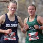Soldotnaճ Tania Boonstra runs just ahead of Colonyճ Aubrey Virgin during the Division I varsity girls race of the Region 3 Championships on Saturday, Sept. 28, 2024, in Wasilla, Alaska. (Photo by Jeremiah Bartz/Frontiersman)