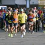 Runners start the Kenai River Marathon on Sunday, Sept. 29, 2024, in Kenai, Alaska. (Photo by Jeff Helminiak/Peninsula Clarion)