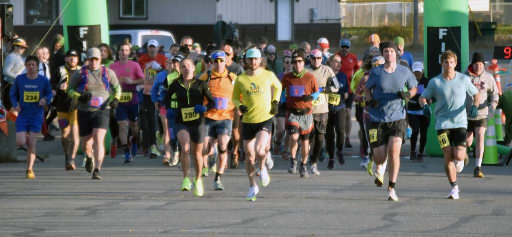 Runners start the Kenai River Marathon on Sunday, Sept. 29, 2024, in Kenai, Alaska. (Photo by Jeff Helminiak/Peninsula Clarion)