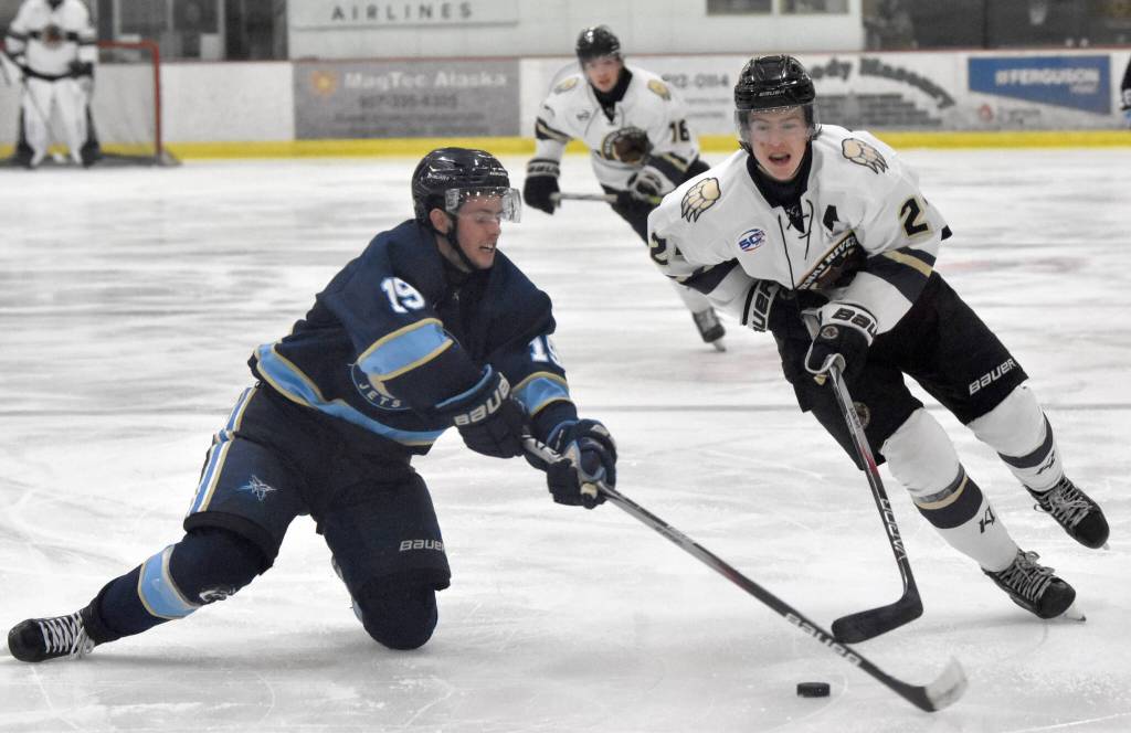 Greye Rampton of the Kenai River Brown Bears tries to skate past Rylan Brady of the Janesville (Wisconsin) Jets on Sunday, Oct. 6, 2024, at the Soldotna Regional Sports Complex in Soldotna, Alaska. (Photo by Jeff Helminiak/Peninsula Clarion)