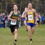 Sewards Antrim Sampson and Kotzebues Ben Marcus compete in the Division II boys race at the state cross-country running meet on Saturday, Oct. 5, 2024, at Bartlett High School in Anchorage, Alaska. (Photo by Jeff Helminiak/Peninsula Clarion)