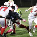 Kenai's Aasen Campanella breaks free for a gain during a playoff win over Redington on Saturday, Oct. 12, 2024, at Redington Jr/Sr High School in Wasilla, Alaska. (Bruce Eggleston/matsusports.net)