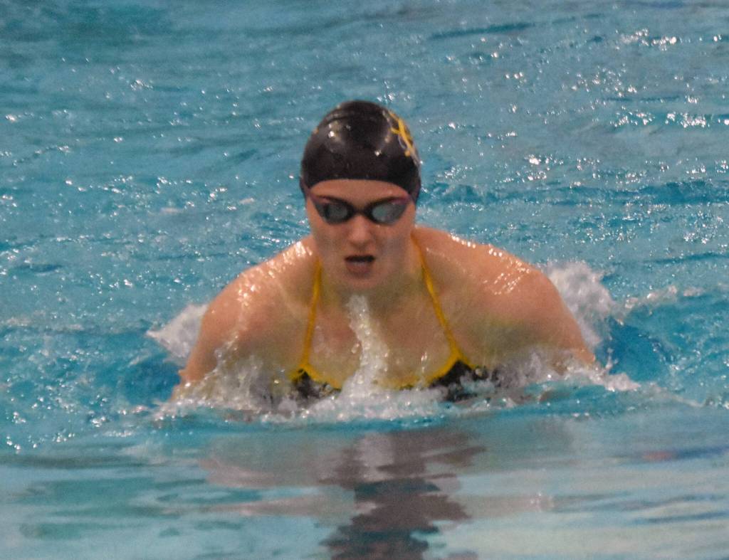 Homers Cassidy Carroll competes in the 100-yard individual medley in the SoHi Pentathlon on Friday, Oct. 11, 2024, at Soldotna High School in Soldotna, Alaska. (Photo by Jeff Helminiak/Peninsula Clarion)