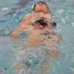 Kenai Centrals Abigail Price competes in the 100-yard individual medley in the SoHi Pentathlon on Friday, Oct. 11, 2024, at Soldotna High School in Soldotna, Alaska. (Photo by Jeff Helminiak/Peninsula Clarion)