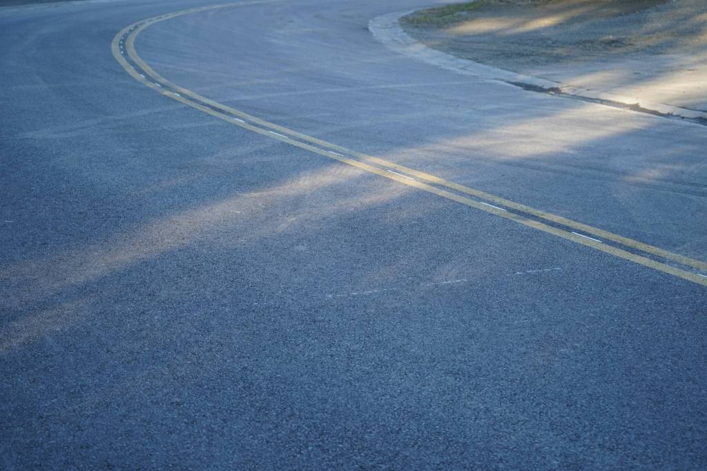 Fresh pavement stretches along Lilac Lane in Kenai, Alaska, on Friday, Oct. 18, 2024. (Jake Dye/Peninsula Clarion)