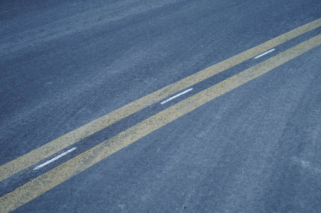Fresh pavement stretches along Lilac Lane in Kenai, Alaska, on Friday, Oct. 18, 2024. (Jake Dye/Peninsula Clarion)