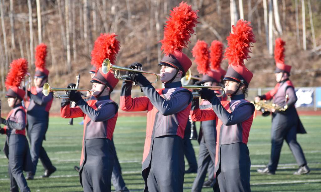 The Kenai Central marching bands performs Saturday, Oct. 19, 2024, in the Division III First National Bowl at Veterans Memorial Field at Wasilla High School in Wasilla, Alaska. (Photo by Jeff Helminiak/Peninsula Clarion)