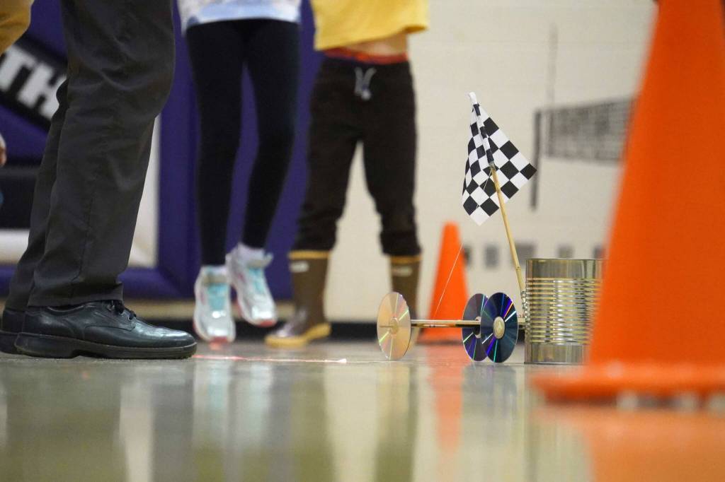 A machine successfully strikes the target can during the Mind-A-Mazes competition at Skyview Middle School near Soldotna, Alaska, on Saturday, Oct. 19, 2024. (Jake Dye/Peninsula Clarion)