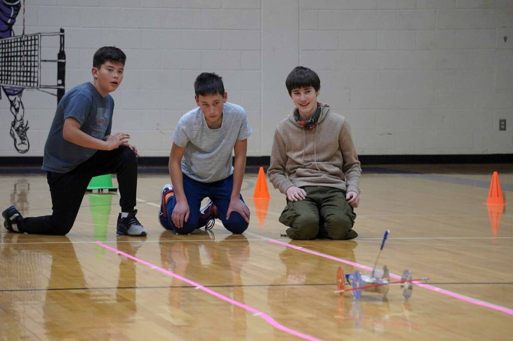 Team Bluey watch their machine roll across the gym floor during the Mind-A-Mazes competition at Skyview Middle School near Soldotna, Alaska, on Saturday, Oct. 19, 2024. (Jake Dye/Peninsula Clarion)