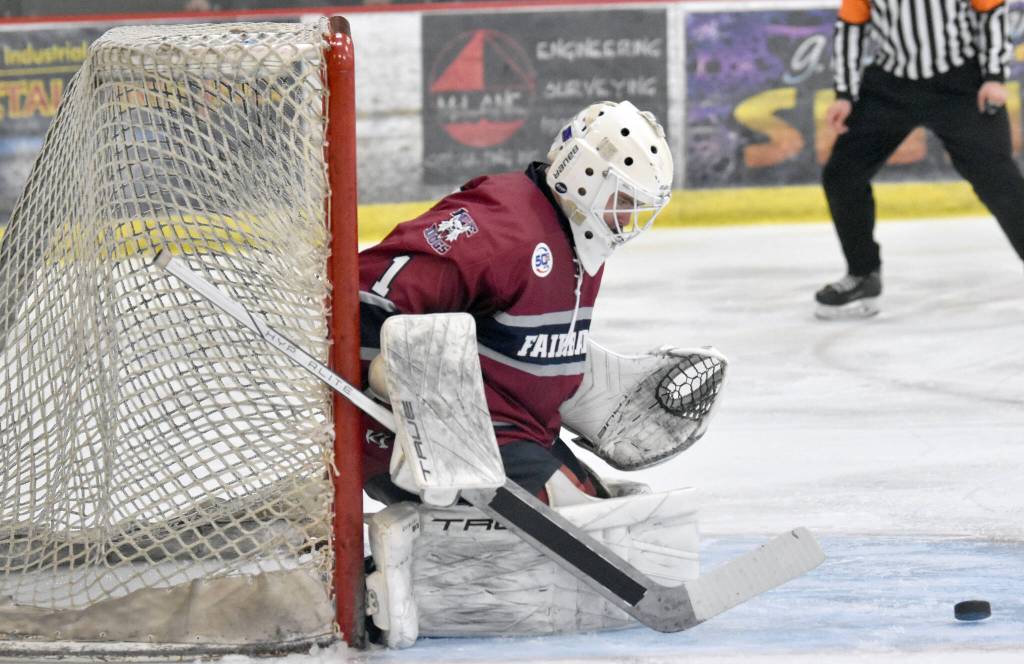 Fairbanks Ice Dogs goalie Mason McElroy makes a save Friday, Oct. 25, 2024, at the Soldotna Regional Sports Complex in Soldotna, Alaska. (Photo by Jeff Helminiak/Peninsula Clarion)