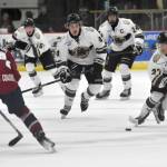 Joseph Yoon of the Kenai River Brown Bears brings the puck up the ice Friday, Oct. 25, 2024, at the Soldotna Regional Sports Complex in Soldotna, Alaska. (Photo by Jeff Helminiak/Peninsula Clarion)