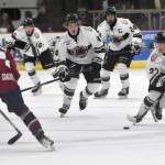 Joseph Yoon of the Kenai River Brown Bears brings the puck up the ice Friday, Oct. 25, 2024, at the Soldotna Regional Sports Complex in Soldotna, Alaska. (Photo by Jeff Helminiak/Peninsula Clarion)