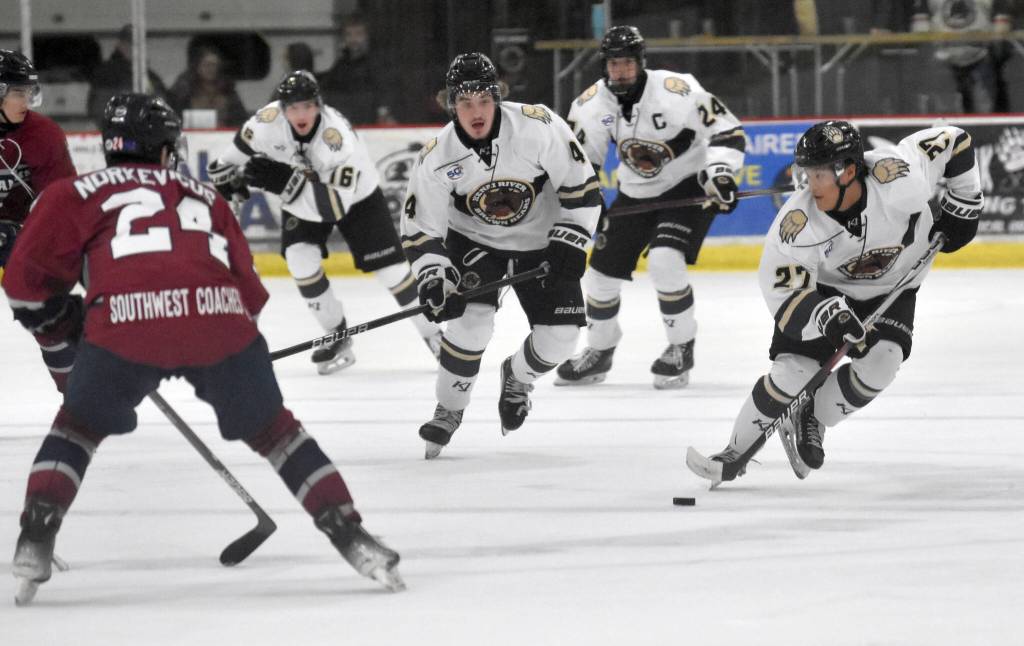 Joseph Yoon of the Kenai River Brown Bears brings the puck up the ice Friday, Oct. 25, 2024, at the Soldotna Regional Sports Complex in Soldotna, Alaska. (Photo by Jeff Helminiak/Peninsula Clarion)