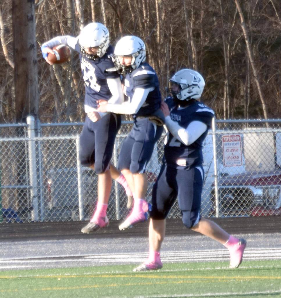 Soldotnas Wyatt Faircloth celebrates his touchdown with Owen Buckbee and Dalton Armstrong on Saturday, Oct. 26, 2024, at the First National Bowl Division II title game at Pride Field at Colony High School in Palmer, Alaska. (Photo by Jeff Helminiak/Peninsula Clarion)