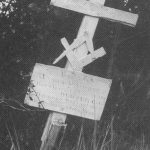 Photo courtesy of the Secora Collection
This 1939 Joe Secora photograph shows the wooden marker on the grave of James Chase, who drowned in Tustumena Lake in 1902.
