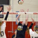 Kenai Central's Ellsi Miller attacks against Soldotna's Cassidy Kruse and Abygale Schaeffer on Friday, Nov. 1, 2024, at Kenai Central High School in Kenai, Alaska. (Photo by Jeff Helminiak/Peninsula Clarion)