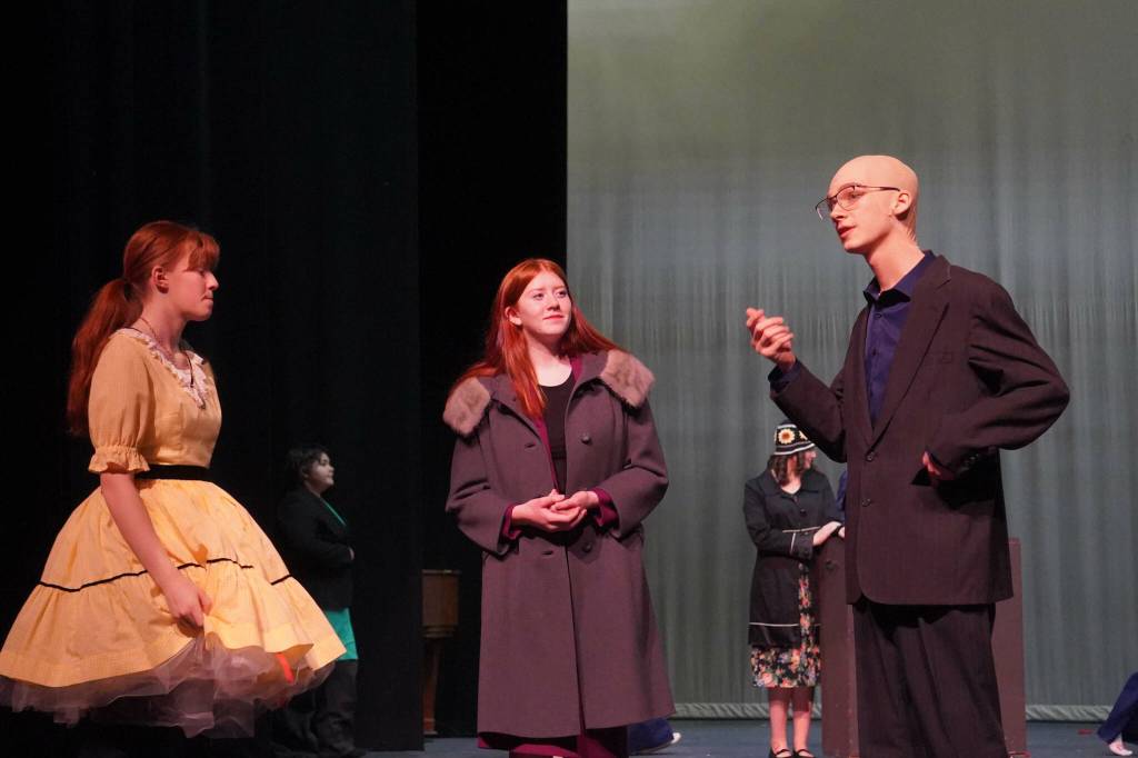 The cast of Annie rehearse at Kenai Central High School in Kenai, Alaska, on Wednesday, Nov. 6, 2024. (Jake Dye/Peninsula Clarion)