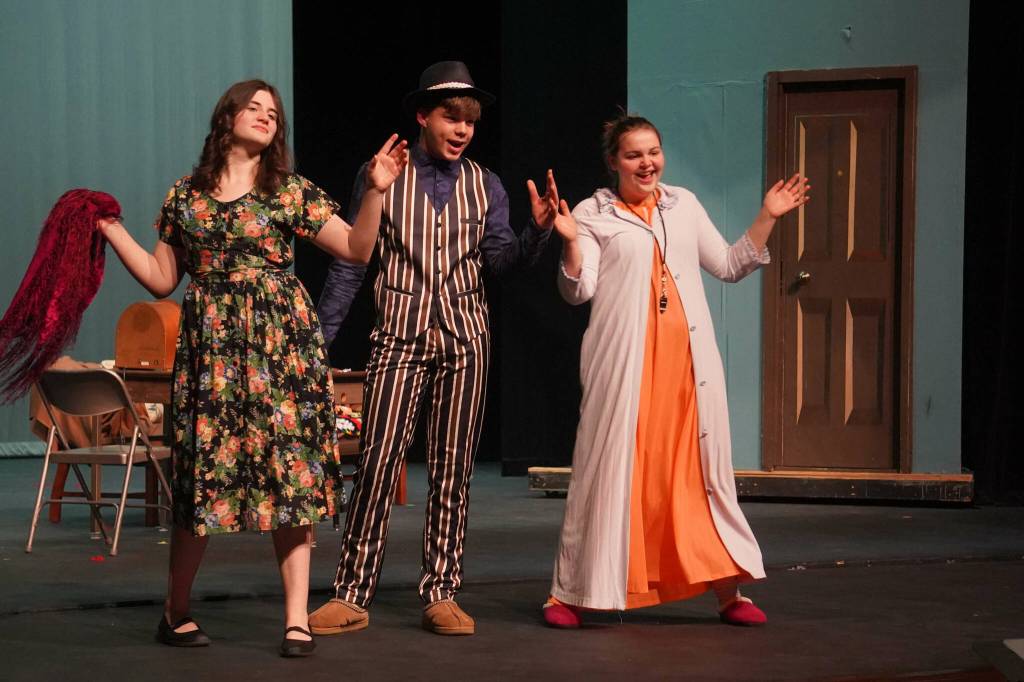 The cast of Annie rehearse at Kenai Central High School in Kenai, Alaska, on Wednesday, Nov. 6, 2024. (Jake Dye/Peninsula Clarion)