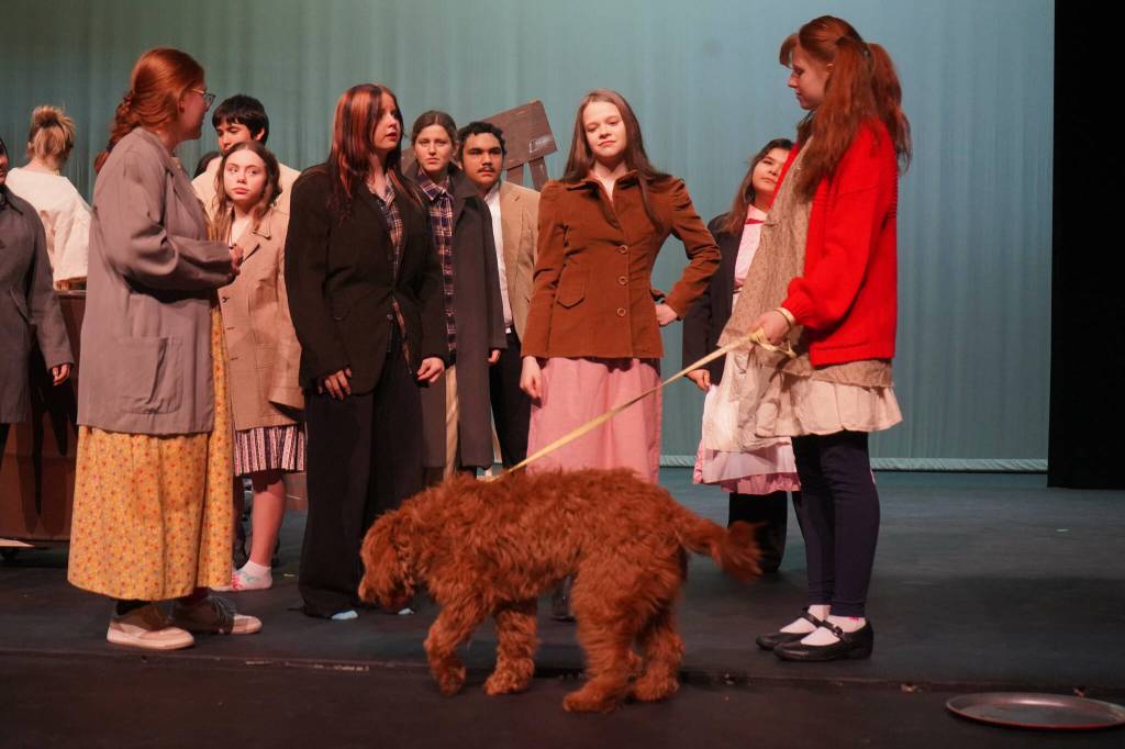 The cast of Annie rehearse at Kenai Central High School in Kenai, Alaska, on Wednesday, Nov. 6, 2024. (Jake Dye/Peninsula Clarion)