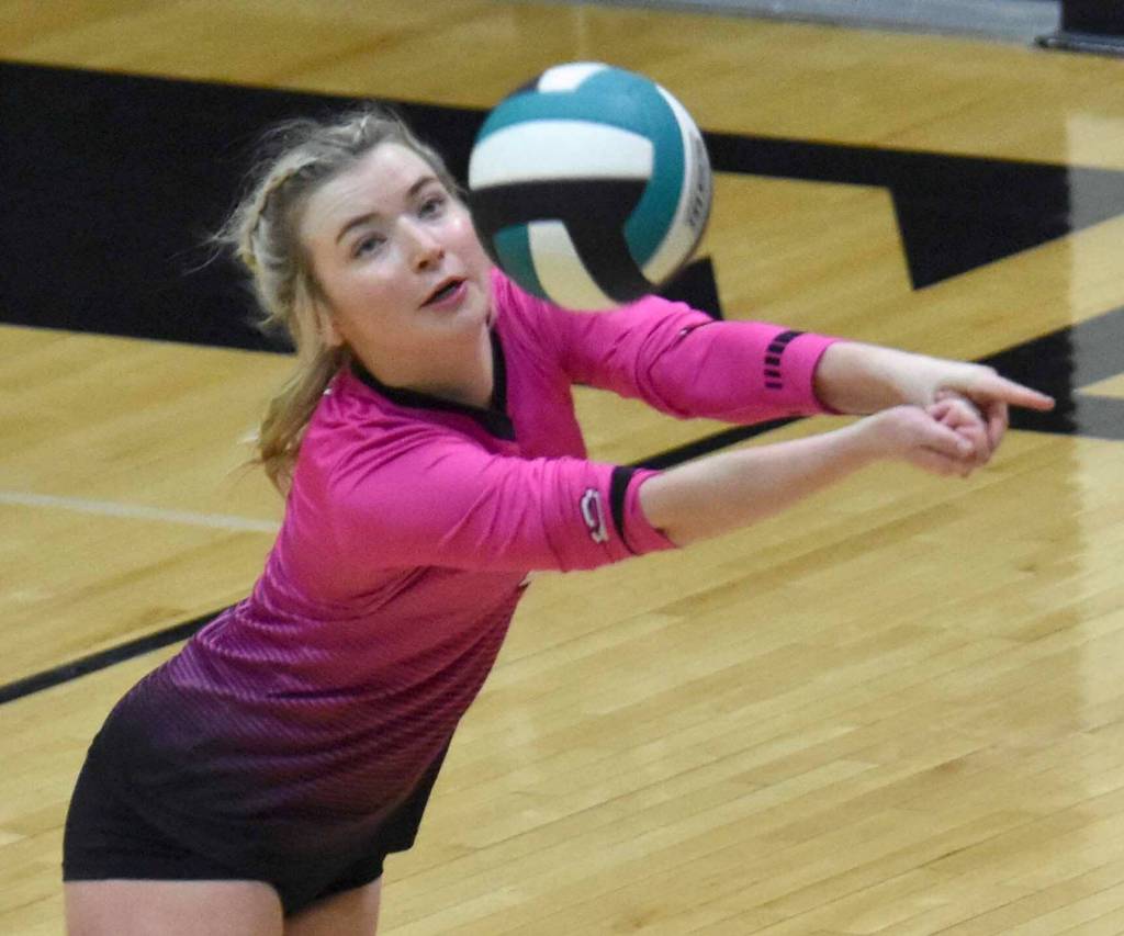 Kenai Centrals Brynnen Hanson digs up a ball at the Southcentral Conference volleyball tournament at Nikiski Middle-High School in Nikiski, Alaska, on Saturday, Nov. 9, 2024. (Photo by Jeff Helminiak/Peninsula Clarion)
