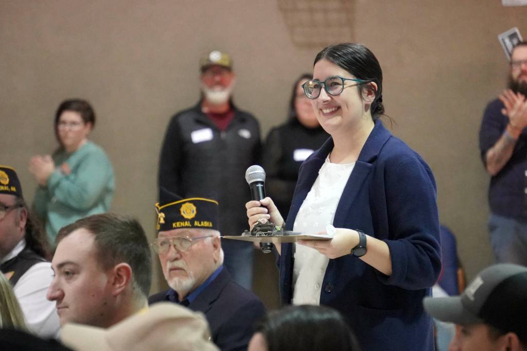 Principal Hannah Dolphin leads a celebration of Veterans Day at Mountain View Elementary School in Kenai, Alaska, on Monday, Nov. 11, 2024. (Jake Dye/Peninsula Clarion)
