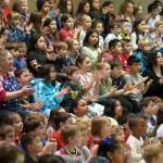 Students applaud as veterans are introduced at Mountain View Elementary in Kenai, Alaska, during a celebration of Veterans Day on Monday, Nov. 11, 2024. (Jake Dye/Peninsula Clarion)