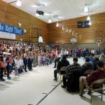Students sing My Country, Tis of Thee at Mountain View Elementary in Kenai, Alaska, during a celebration of Veterans Day on Monday, Nov. 11, 2024. (Jake Dye/Peninsula Clarion)