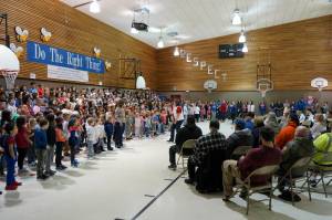 Students sing My Country, Tis of Thee at Mountain View Elementary in Kenai, Alaska, during a celebration of Veterans Day on Monday, Nov. 11, 2024. (Jake Dye/Peninsula Clarion)