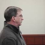 Joseph Miller Jr., an Alaska State Trooper charged with felony first-degree assault, appears for an arraignment at the Kenai Courthouse in Kenai, Alaska, on Thursday, Nov. 14, 2024. (Jake Dye/Peninsula Clarion)