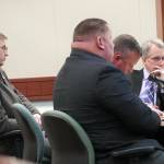 From left: Joseph Miller Jr. and Jason Woodruff, Alaska State Troopers charged with felony first-degree assault, appear with their lawyers, Clinton Campion and Matthew Widmer, for an arraignment at the Kenai Courthouse in Kenai, Alaska, on Thursday, Nov. 14, 2024. (Jake Dye/Peninsula Clarion)