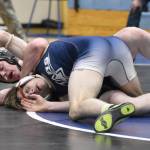 Soldotnas Jackson Anding wrestles to a major decision over Ninilchiks Brandt Mill on Tuesday, Nov. 19, 2024, at Soldotna High School in Soldotna, Alaska. (Photo by Jeff Helminiak/Peninsula Clarion)